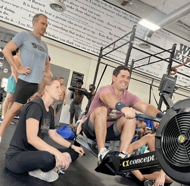 man using rowing machine at Rock the Row Nashville