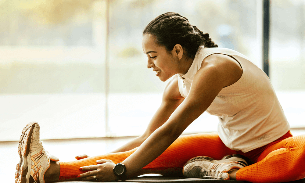 girl stretching on a yoga mat