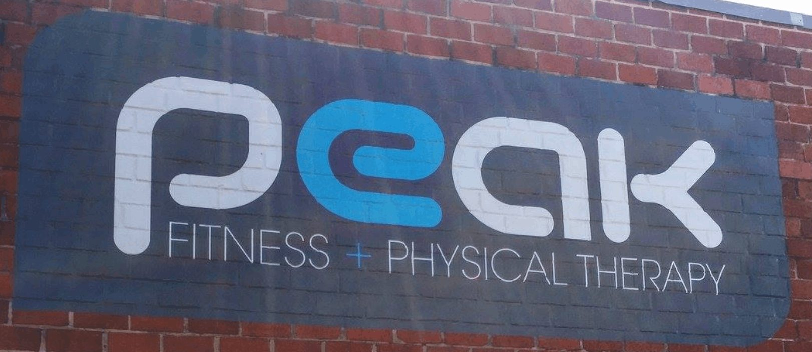 peak fitness and physical therapy sign