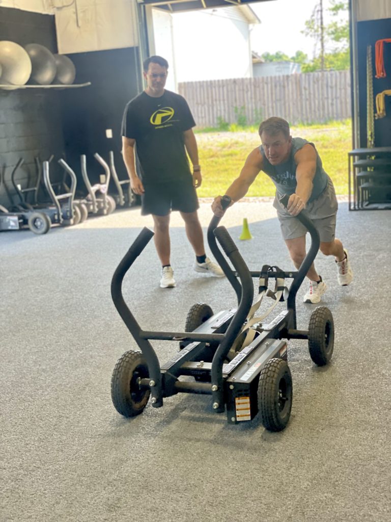 cancer survivor working out at gym